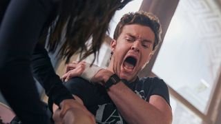 Jack Quaid (Hughie Campbell) screaming in pain in The Boys