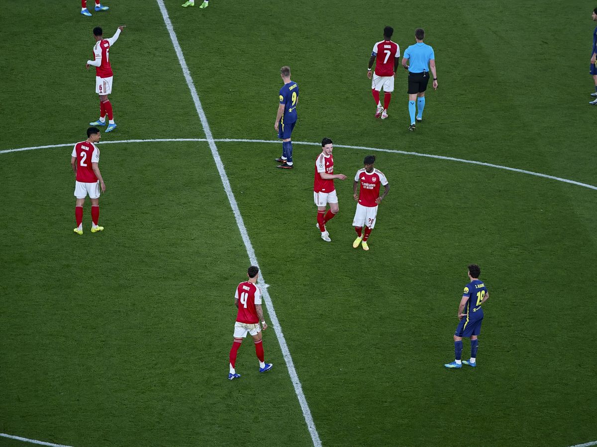 Action photos during a Champions League soccer match at Arsenal's Emirates stadium, taken with the Oppo Find X9 Ultra and teleconverter lens