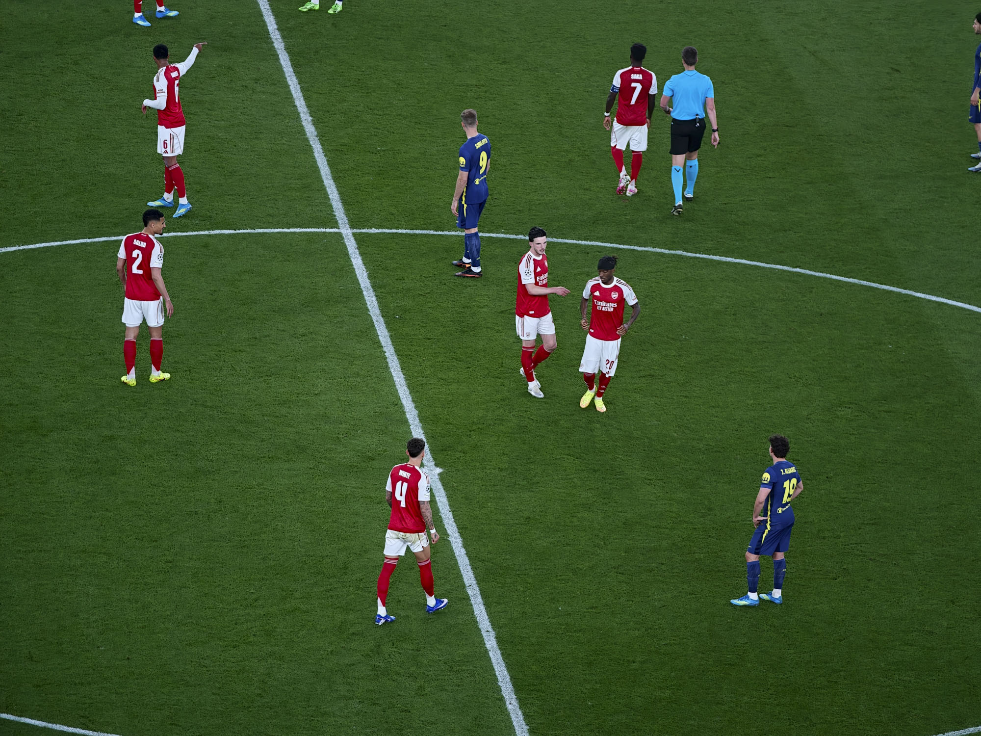 Action photos during a Champions League soccer match at Arsenal's Emirates stadium, taken with the Oppo Find X9 Ultra and teleconverter lens
