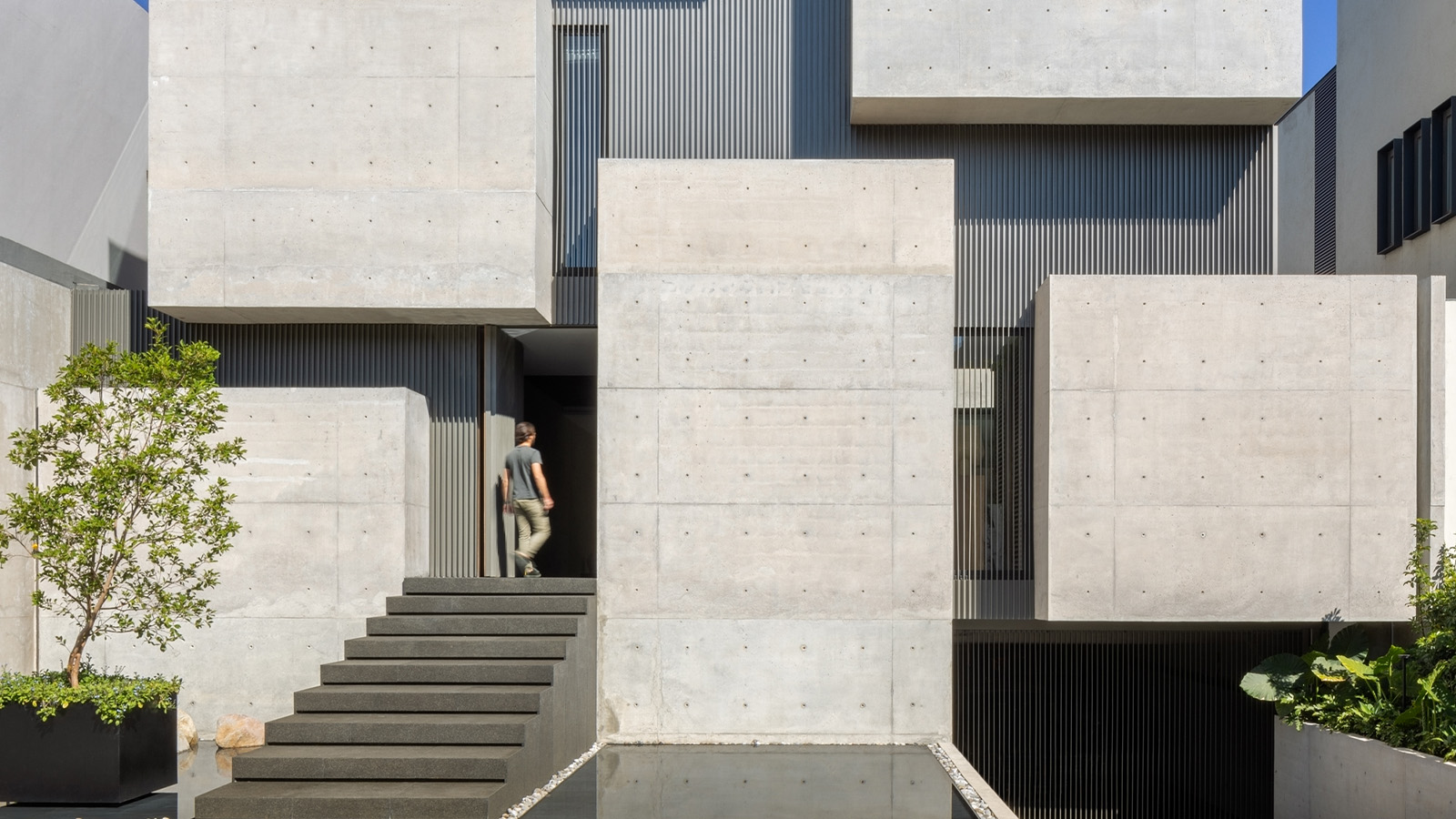 the concrete facade of the cubist house Casa Ailes in Mexico City Jaime Guzmán Creative Group