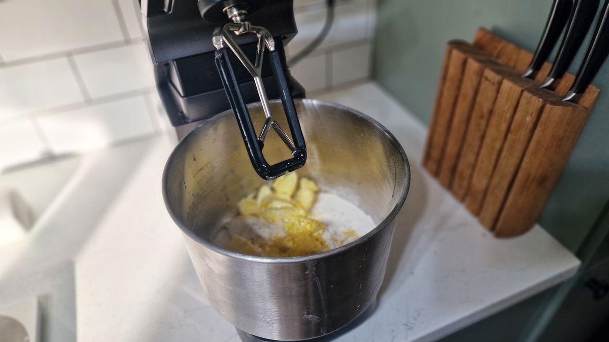 The Ooni Halo Pro Spiral mixer being tested in a green and white kitchen