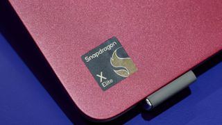 Qualcomm Snapdragon X Elite chip logo on a laptop