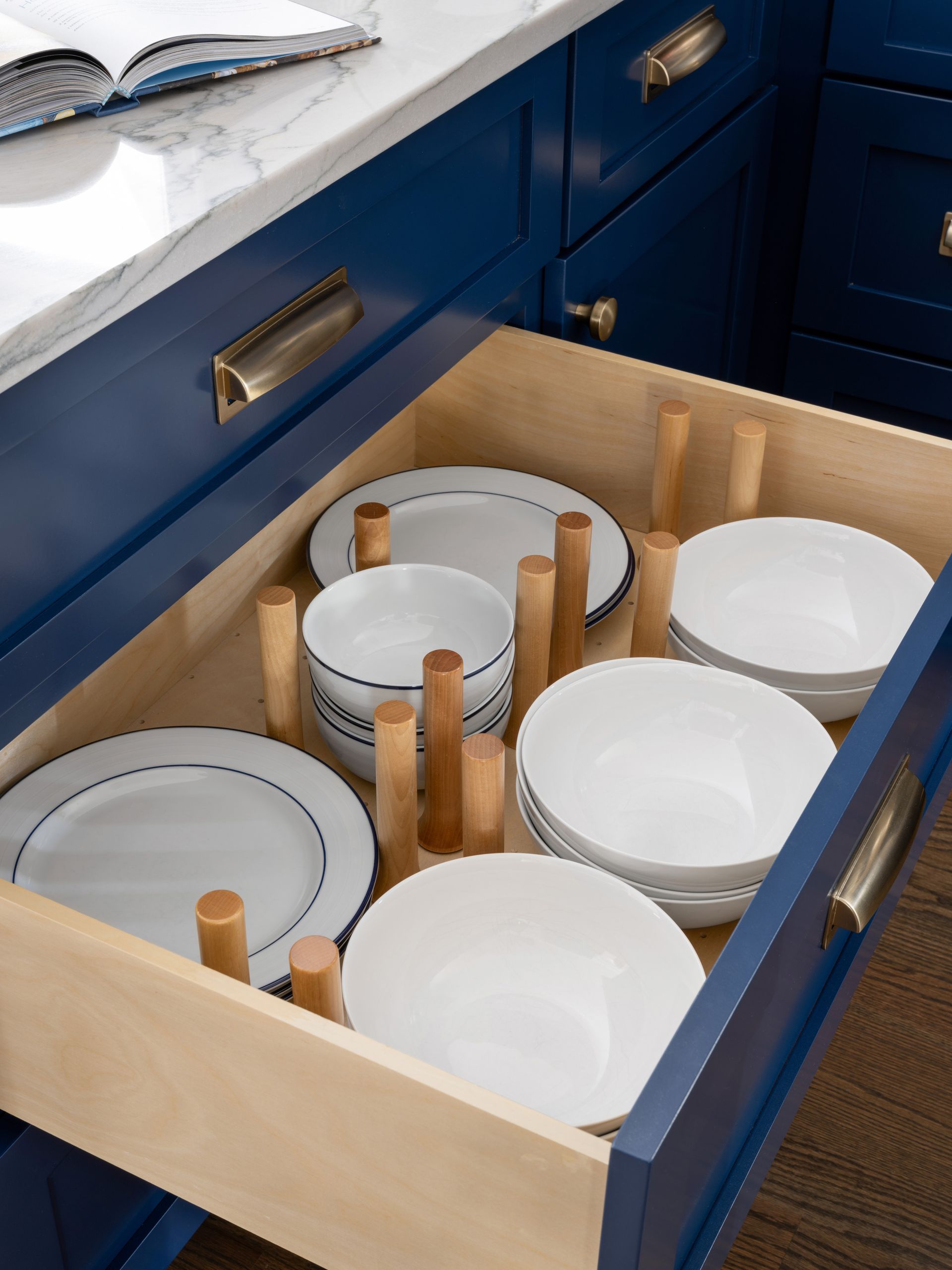 Crockery organized in kitchen drawer