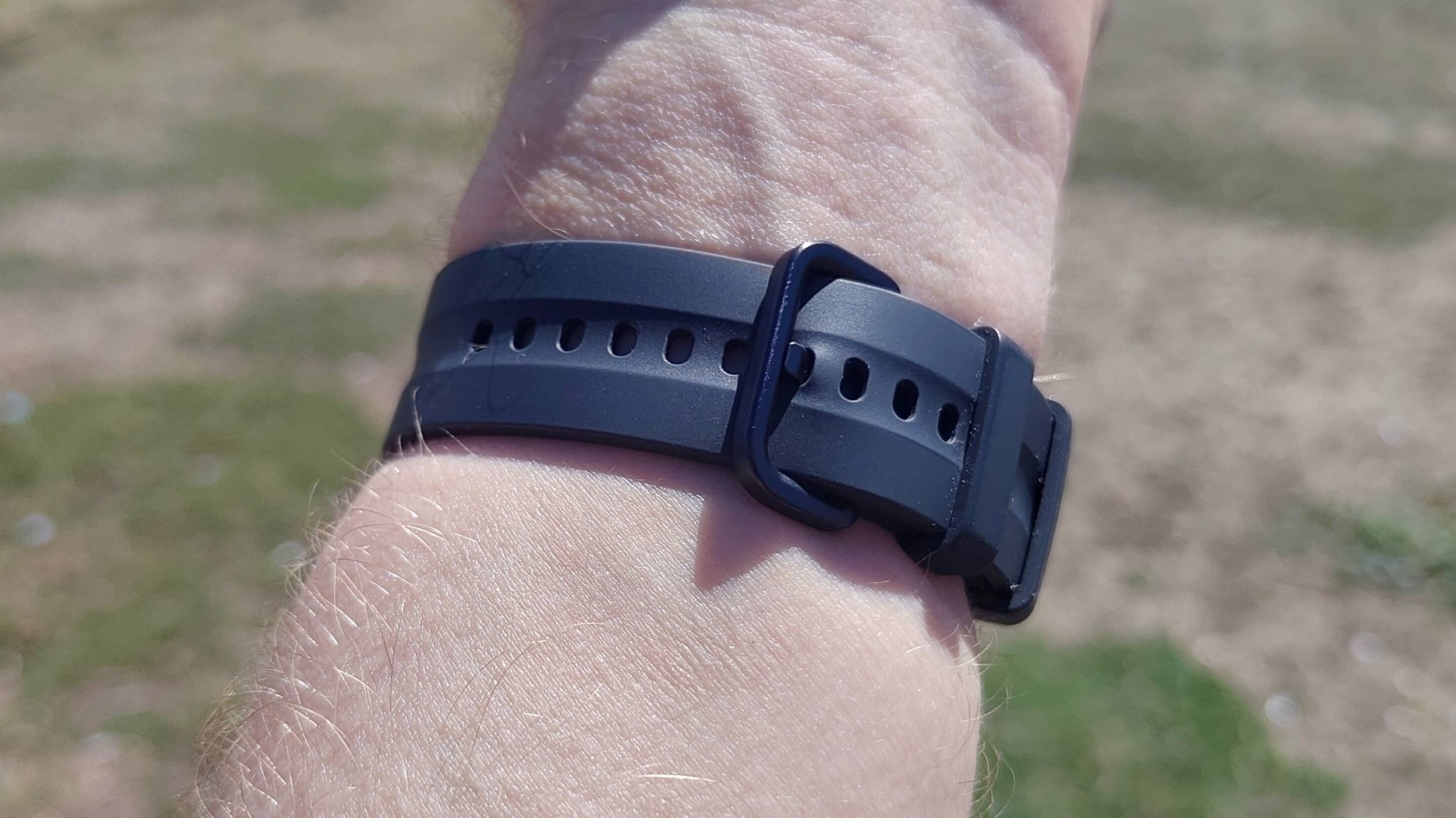 The Samsung Galaxy Watch 9 on a man's wrist, showing the strap.