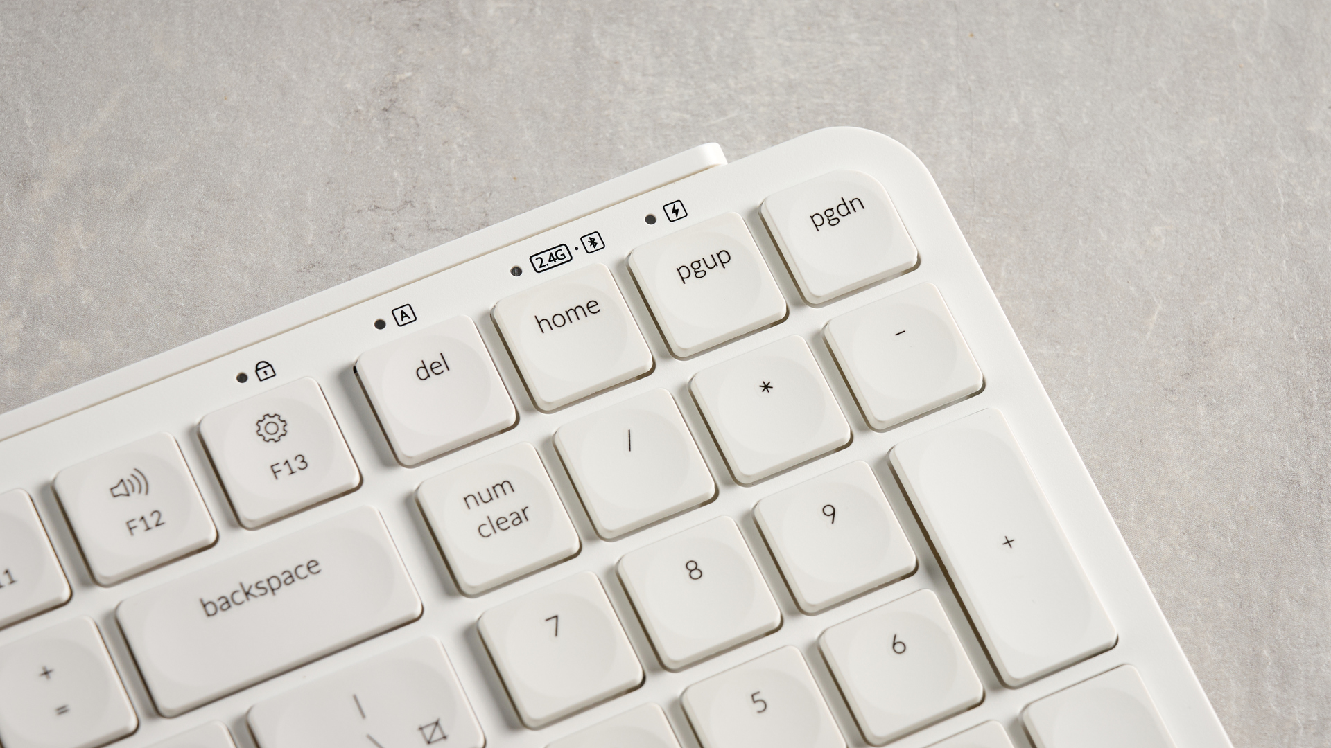 Keychron B2 Pro ultra-slim low profile keyboard in white photographed on a grey background.