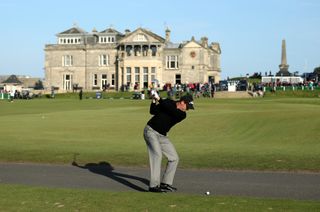 David Howell playing from integral road on 18 at St Andrews
