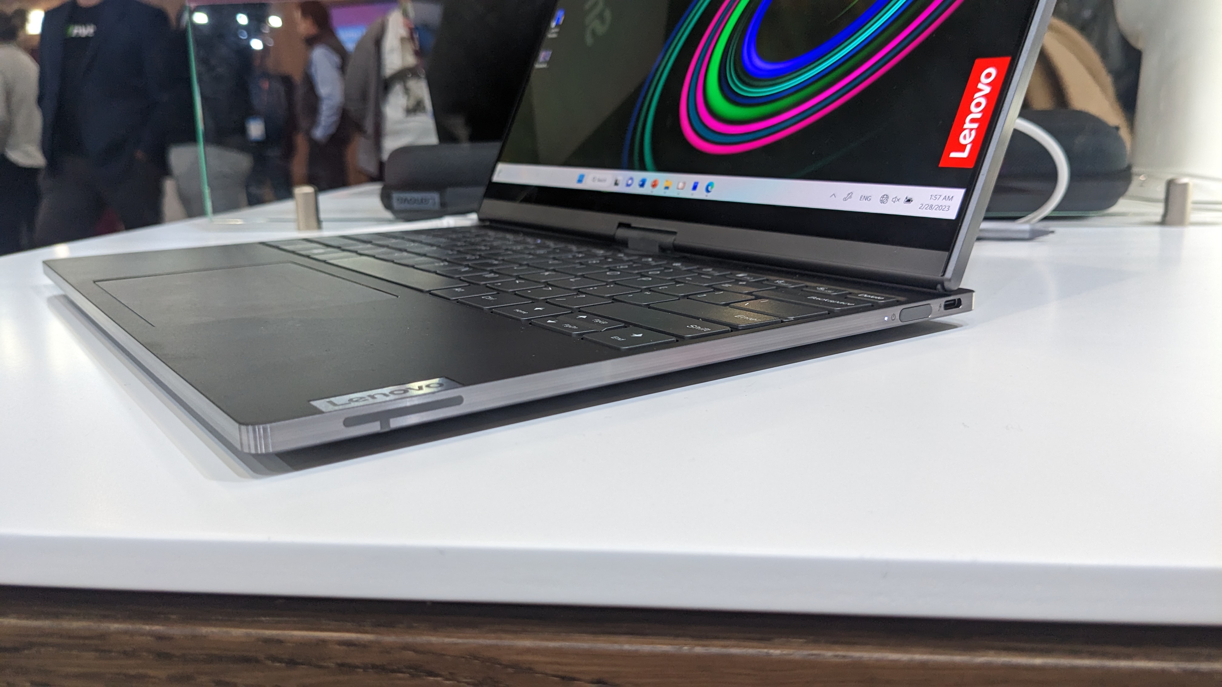 The Lenovo ThinkBook Plus Twist laptop on a display stand at the MWC 2023 event.