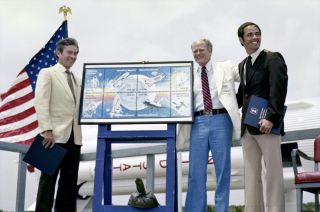 STS-1 astronauts John Young (at left) and Bob Crippen (right) with space artist Robert McCall at the dedication ceremony for the 1981 "Space Achievement" stamps released by the USPS.