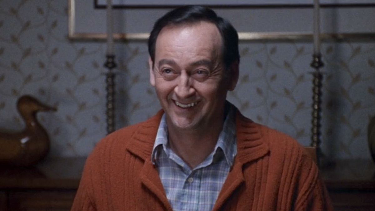 Harold Weir smiling at dinner table in Freaks and Geeks