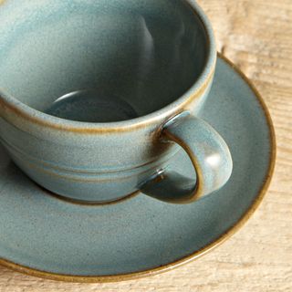 blue colour tea cup with saucer