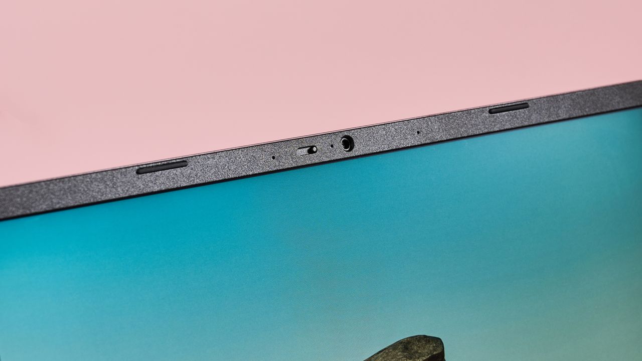 Close-up of camera on Acer Chromebook Plus 516 with pink background