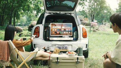 a portable TV in the boot of a car