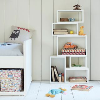 childrens furniture with puzzler shelves and white flooring