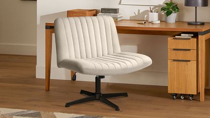 AKA the Amazon criss-cross chair, the Pukami Armless Office Desk Chair sits in front of a midcentury wooden desk