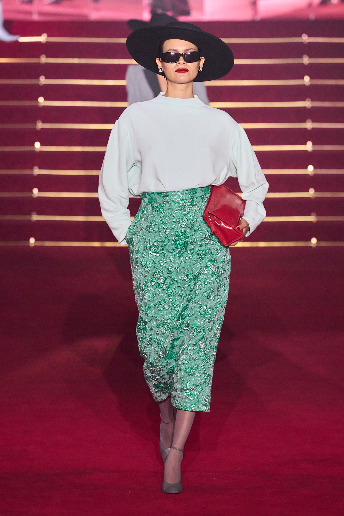A model wore a teal skirt set during Willy Chavarria&#039;s Spring 2026 show