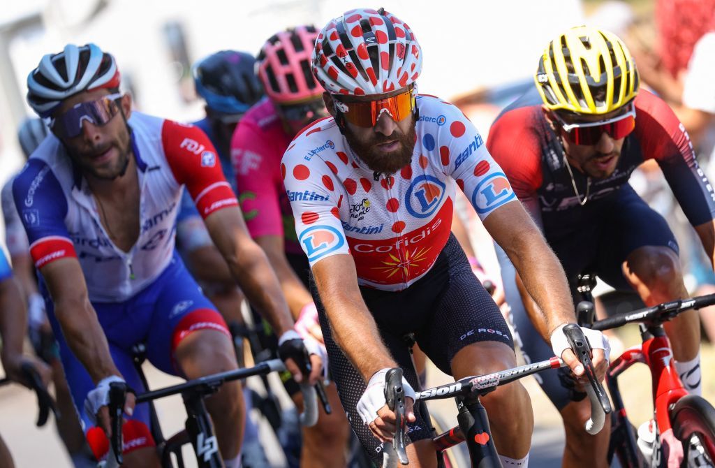 GroupamaFDJ teams French rider Thibaut Pinot L and Cofidis teams German rider Simon Geschke wearing the climbers dotted jersey R cycle during the 14th stage of the 109th edition of the Tour de France cycling race 1925 km between SaintEtienne and Mende in central France on July 16 2022 Photo by Thomas SAMSON AFP Photo by THOMAS SAMSONAFP via Getty Images