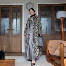 Hannah Almassi wears a leopard print Rixo coat