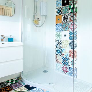 bathroom with shower and mirror