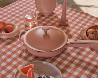 Always Pan in pink on gingham tablecloth