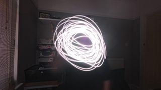 A photo of circular light trails painted using the INsta360 Ace Pro 2's Starlapse mode.