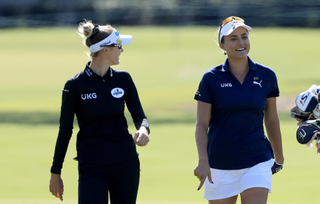 Nelly Korda and Lexi Thompson laugh together during an LPGA event