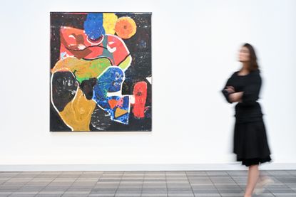 woman in front of painting at frieze