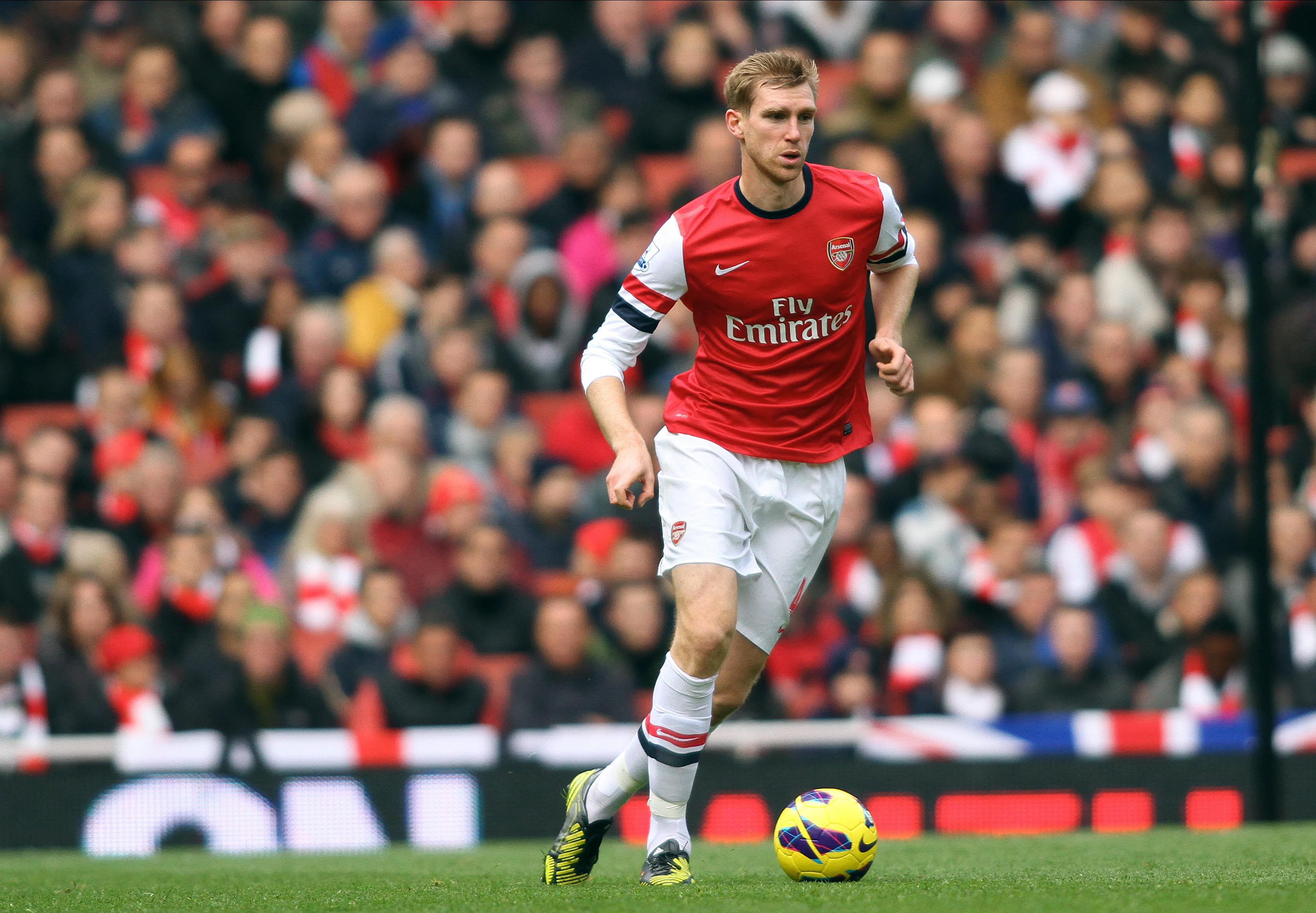 Per Mertesacker playing for Arsenal in 2012