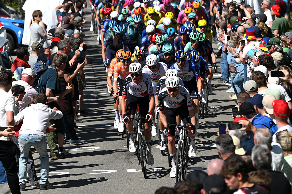 Pavel Sivakov of France and UAE Team Emirates - XRG and a general view of the peloton climbing the Cote de Stockeu during the 112th Liege - Bastogne - Liege 2026 