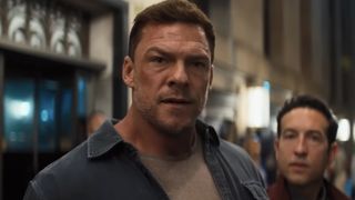 Reacher on NYC street in front of Jacog Merrick in Reacher Season 4