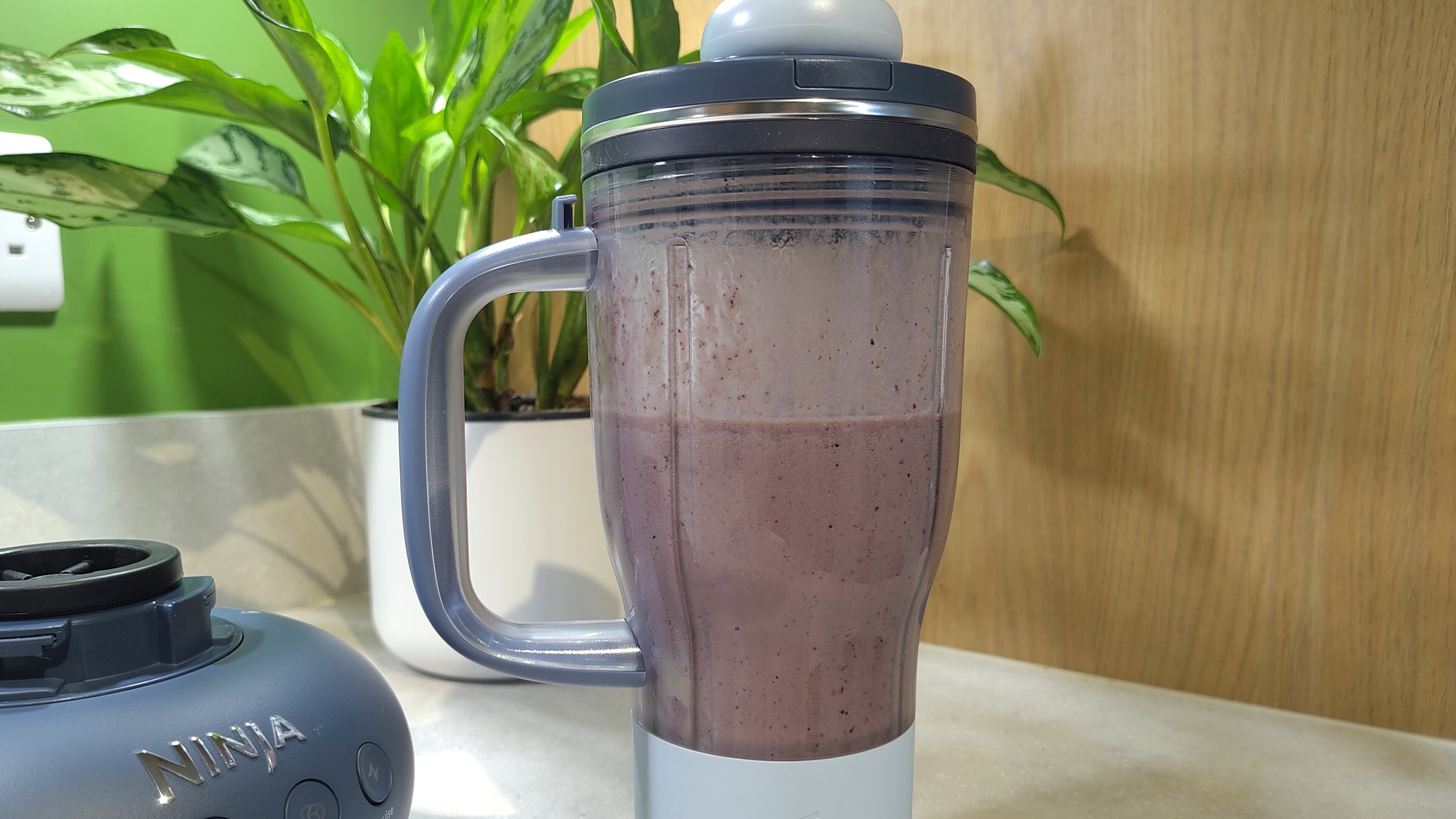 Ninja BlendBoss blender with pink smoothie