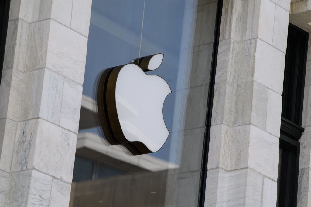 The Apple logo displayed on a store building in Washington, DC