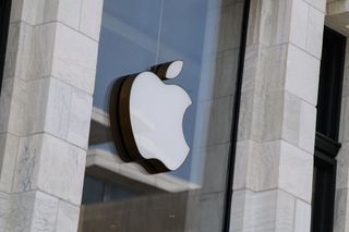 The Apple logo displayed on a store building in Washington, DC