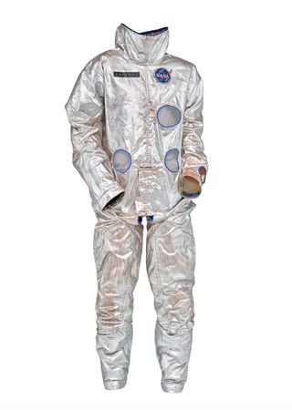 a silver flight suit against a white background