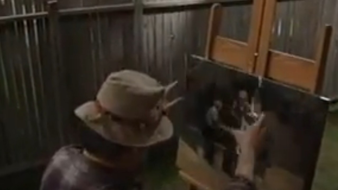 Earl Hindman painting a picture on Home Improvement