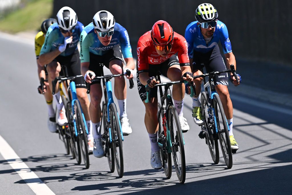 LEYSIN SWITZERLAND APRIL 27 LR Dorian Godon of France and Decathlon AG2R La Mondiale Team Raul Garcia Pierna of Spain and Team Arkea BB Hotels and Nelson Oliveira of Portugal and Movistar Team compete in the breakaway during the 77th Tour De Romandie 2024 Stage 4 a 1592km stage from Saillon to Leysin 1314m UCIWT on April 27 2024 in Leysin Switzerland Photo by Luc ClaessenGetty Images