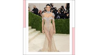 Kendall Jenner wears a sheer, diamond embellished dress as she attends The 2021 Met Gala Celebrating In America: A Lexicon Of Fashion at Metropolitan Museum of Art on September 13, 2021 in New York City.