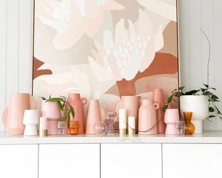 Group of modern sculptural vases in pink and blush shades