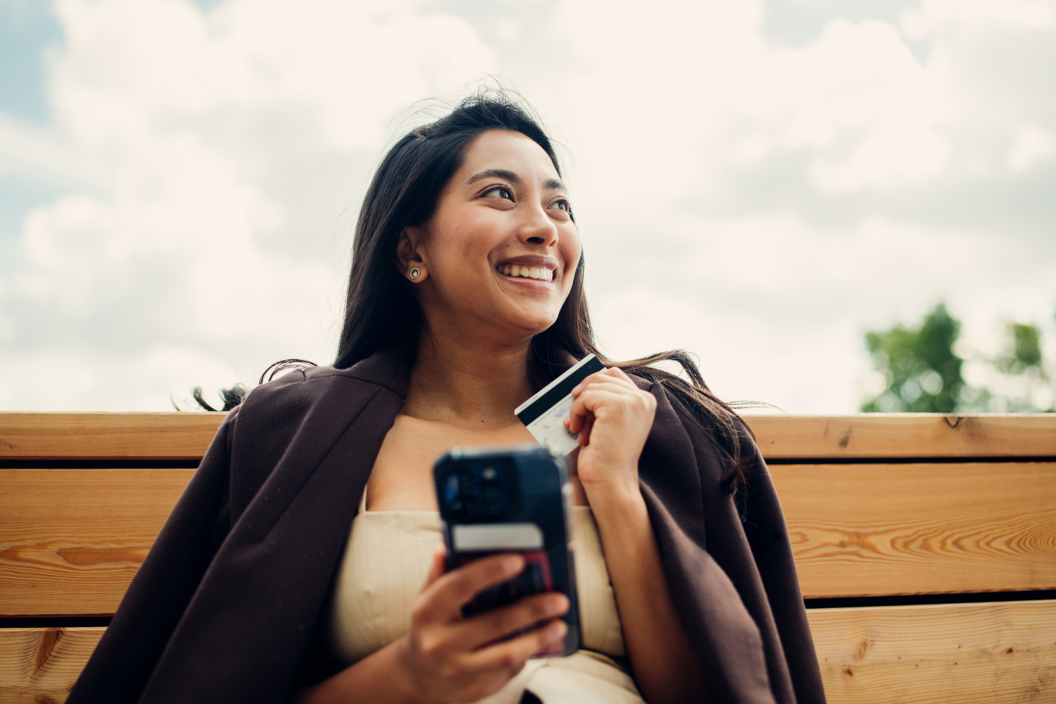 woman holding credit card