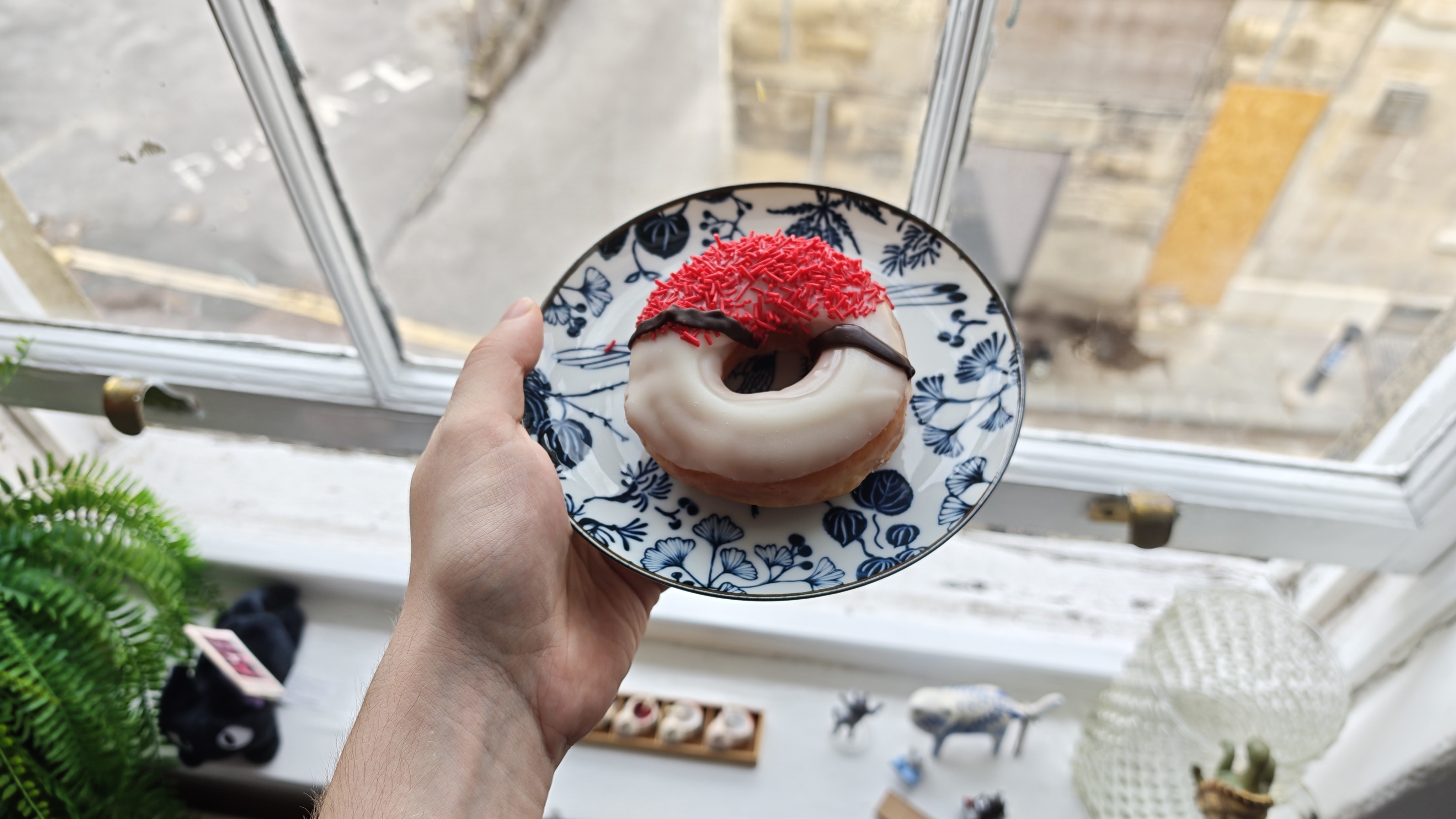 Pok&amp;eacute; Ball donut from the Pok&amp;eacute;mon x Krispy Kreme collection