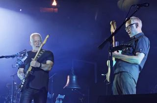 Chester Kamen onstage trading licks with David Gilmour