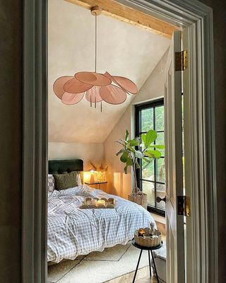 bedroom with pink and green accents