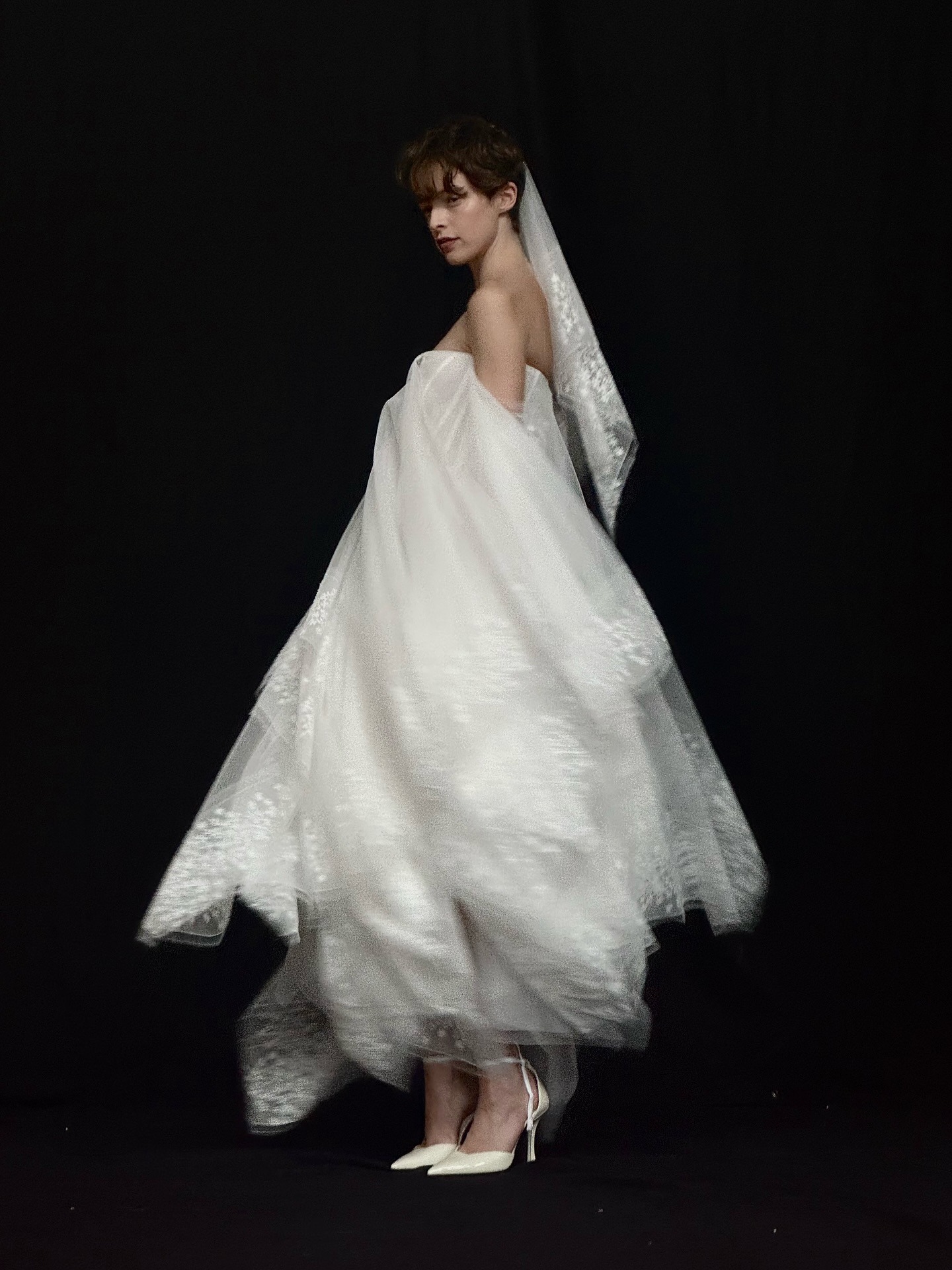 Photo of model wearing Wed Studio wedding dress.
