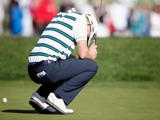 Vaughn Taylor reacts to a missed birdie putt on the 18th green
