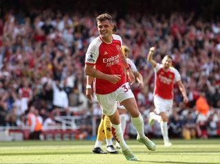 Granit Xhaka of Arsenal celebrates after scoring their sides first goal during the Premier League match between Arsenal FC and Wolverhampton Wanderers at Emirates Stadium on May 28, 2023 in London, England.