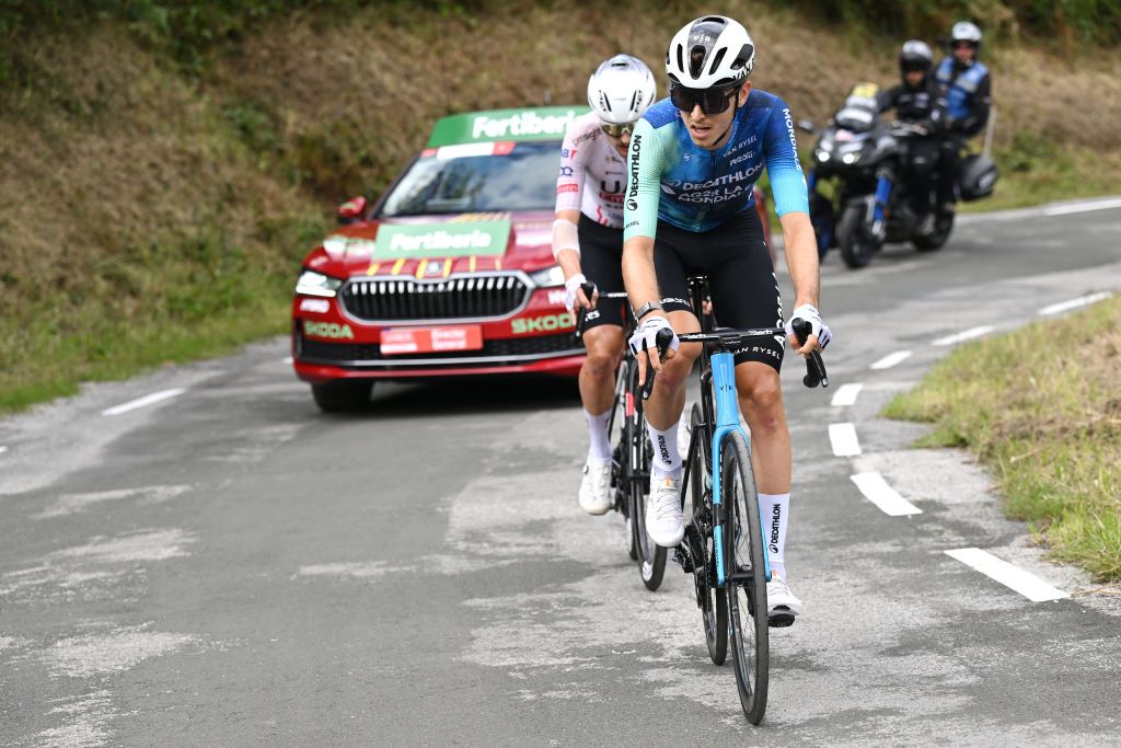 PICON BLANCO BURGOS SPAIN SEPTEMBER 07 LR Jay Vine of Australia and UAE Team Emirates and Clement Berthet of France and Team Decathlon AG2R La Mondiale compete in the chase group during the La Vuelta 79th Tour of Spain 2024 Stage 20 a 172km stage from Villarcayo to Picon Blanco 1491m UCIWT on September 07 2024 in Picon Blanco Burgos Spain Photo by Tim de WaeleGetty Images