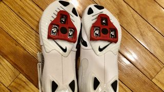 A photo of the cleats on the Nike SuperRep cycling shoes