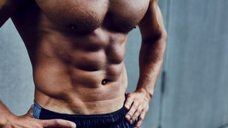 a photo of a man with strong abdominal muscles 