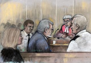 Court drawing by Elizabeth Cook of Rolf Harris in the dock at Southwark Crown in London as he listens to Mr Justice Sweeney sentence him to jail for five years and nine months for a string of sex crimes involving four girls, as his dughter, Bindi, looks on.