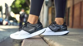 Woman wearing Hoka Transport X running shoes