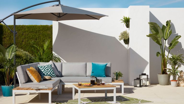 large cantilever parasol and outdoor sofa on a patio